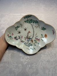 Four Chinese blue, white and famille rose tazzas and a covered spice bowl with bats design, 19th C.