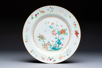 Four Chinese famille rose 'Roosters' plates and a 'Crane' dish, Qianlong