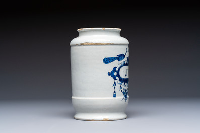 A blue and white Dutch Delft tobacco jar and a drug jar with brass lids, 18th C.