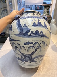 A Chinese blue and white 'Mountainous Landscape' vase with four lion-form handles, 16/17th C.