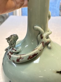 A Chinese 'Faux-Marble' celadon-ground vase with a copper-red-decorated chilong in relief, Qianlong mark and of the period