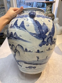 A Chinese blue and white 'Mountainous Landscape' vase with four lion-form handles, 16/17th C.