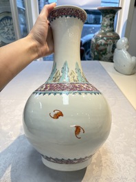 A Chinese famille rose vase with floral design, Hongxian mark and of the period