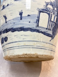 A Chinese blue and white 'Mountainous Landscape' vase with four lion-form handles, 16/17th C.