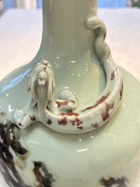 A Chinese 'Faux-Marble' celadon-ground vase with a copper-red-decorated chilong in relief, Qianlong mark and of the period