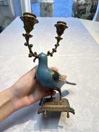 A pair of Chinese cloisonn&eacute; pigeons mounted as candelabras, 19th C.