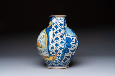 An unusual large polychrome Italian maiolica two-handled 'Cupid and Psyche' wet drug jar inscribed 'Rodomel', probably Rome, early 16th C.