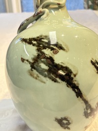 A Chinese 'Faux-Marble' celadon-ground vase with a copper-red-decorated chilong in relief, Qianlong mark and of the period