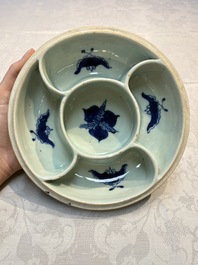 Four Chinese blue, white and famille rose tazzas and a covered spice bowl with bats design, 19th C.