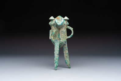 A Chinese archaic bronze wine vessel with Taotie design, Jue 爵, late Shang