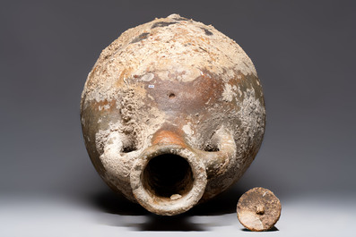A Roman salt fish amphora and cover, Spain, 2nd/3rd C.
