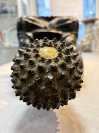 A large Chinese gilt-lacquered bronze Buddha, 17th C.