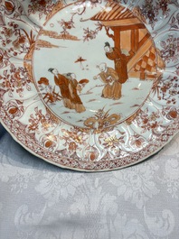 A Chinese iron-red and gilt-decorated dish with a garden scene, Kangxi
