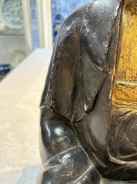 A large Chinese gilt-lacquered bronze Buddha, 17th C.