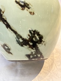 A Chinese 'Faux-Marble' celadon-ground vase with a copper-red-decorated chilong in relief, Qianlong mark and of the period