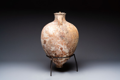 A Roman pottery olive oil transport amphora with original cover, South of Spain, 1st/3rd C.