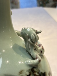 A Chinese 'Faux-Marble' celadon-ground vase with a copper-red-decorated chilong in relief, Qianlong mark and of the period