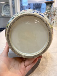 A Chinese famille rose yellow-ground &lsquo;Bats and Peaches&rsquo; bottle vase, Jiaqing/Daoguang