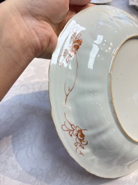 A Chinese iron-red and gilt-decorated dish with a garden scene, Kangxi