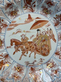 A Chinese iron-red and gilt-decorated dish with a courtly carriage scene, Kangxi