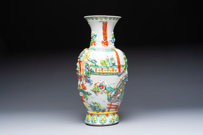 A Chinese famille verte '100 Boys' vase with relief design, 20th C.