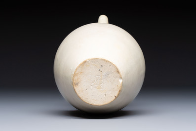 A Chinese Xingyao white-glazed ewer, Ying 盈 mark, Tang or later