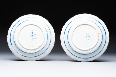 A pair of blue and white Dutch Delft 'Cranes' plates and a dish, 18th C.
