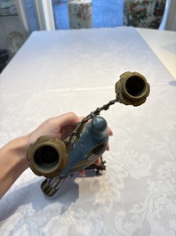 A pair of Chinese cloisonn&eacute; pigeons mounted as candelabras, 19th C.