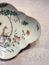 Four Chinese blue, white and famille rose tazzas and a covered spice bowl with bats design, 19th C.