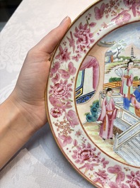 A fine Chinese Canton famille rose dish with puce-enamelled rim, 19th C.