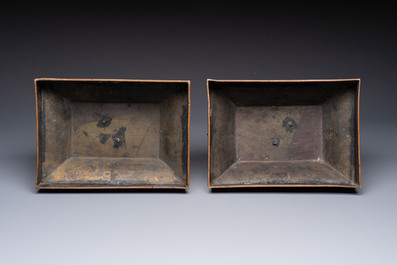 A pair of Chinese cloisonn&eacute; 'Fangding' censers and covers with Taotie design on carved wooden stands, 19th C.