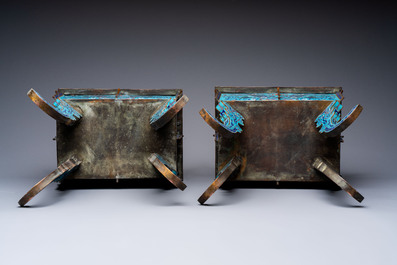 A pair of Chinese cloisonn&eacute; 'Fangding' censers and covers with Taotie design on carved wooden stands, 19th C.