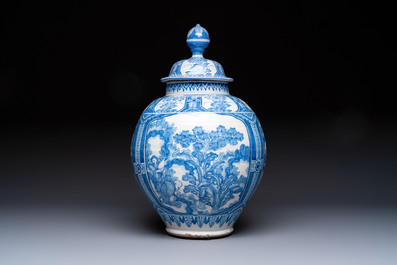 A large blue and white Dutch Delft chinoiserie vase and cover, 17th C.