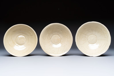 A group of nine Chinese celadon-glazed bowls with incised floral design from the Jepara shipwreck, Fujian kilns, Song