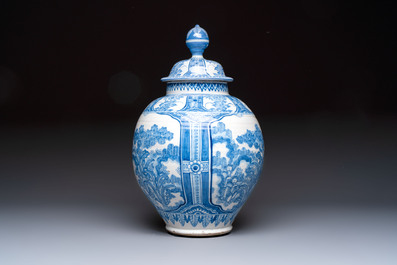 A large blue and white Dutch Delft chinoiserie vase and cover, 17th C.