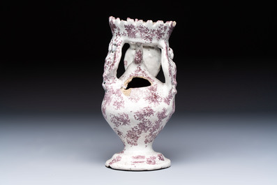A continental manganese- and white-splashed pottery money bank, 18/19th C.