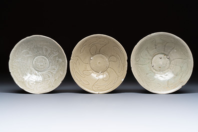 A group of ten Chinese celadon-glazed bowls with incised floral design from the Jepara shipwreck, Fujian kilns, Song