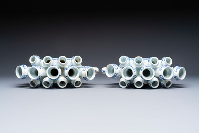 A pair of large blue and white Dutch Delft tulip vases, 19th C.