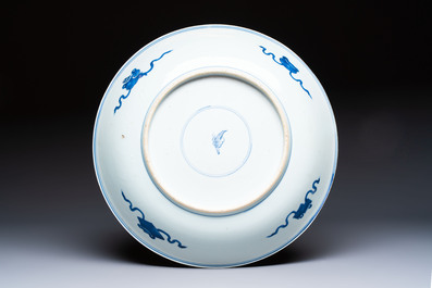 A large Chinese blue and white 'Lotus Scroll' dish, Kangxi