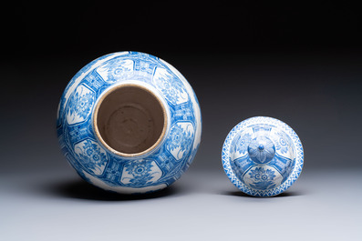 A large blue and white Dutch Delft chinoiserie vase and cover, 17th C.