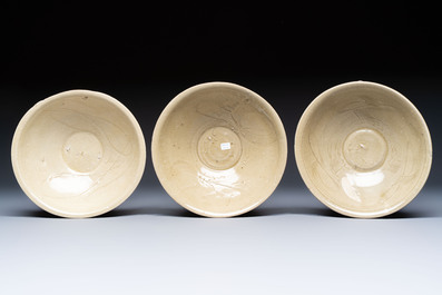 A group of nine Chinese celadon-glazed bowls with incised floral design from the Jepara shipwreck, Fujian kilns, Song