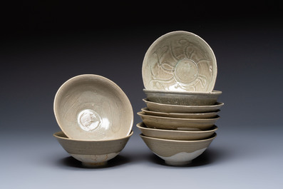 A group of nine Chinese celadon-glazed bowls with incised floral design from the Jepara shipwreck, Fujian kilns, Song