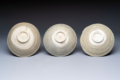 A group of nine Chinese celadon-glazed bowls with incised floral design from the Jepara shipwreck, Fujian kilns, Song