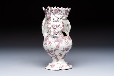 A continental manganese- and white-splashed pottery money bank, 18/19th C.