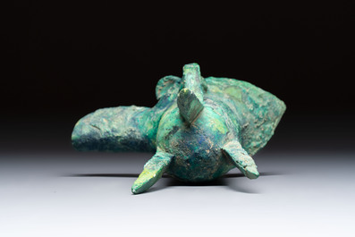 A Chinese archaic bronze wine vessel with Taotie design, Jue 爵, late Shang