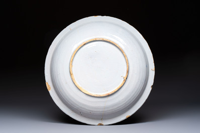 A blue and white Dutch Delft 'Titus Manlius' dish, after an engraving by Hendrick Goltzius, late 17th C.