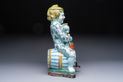 A massive polychrome French faience 'Bacchus' table fountain, Rouen, 18th C.