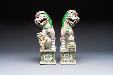A pair of Chinese verte biscuit models of Buddhist lions, 18th C.