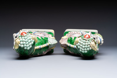 A pair of Chinese verte biscuit models of Buddhist lions, 18th C.
