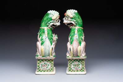 A pair of Chinese verte biscuit models of Buddhist lions, 18th C.